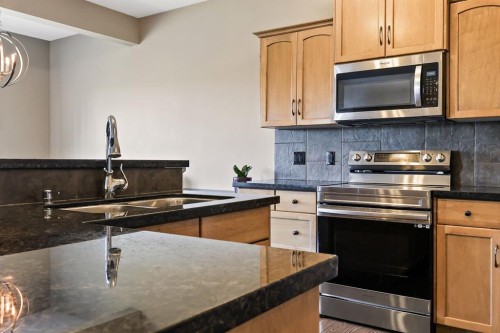 114 Everglen Crescent Sw, Calgary, AB - Indoor Photo Showing Kitchen With Double Sink