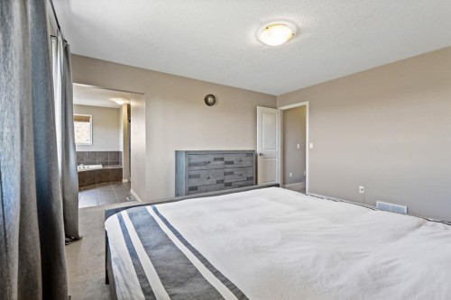 114 Everglen Crescent Sw, Calgary, AB - Indoor Photo Showing Bedroom