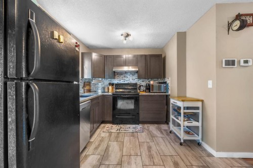 62 Fonda Crescent Se, Calgary, AB - Indoor Photo Showing Kitchen