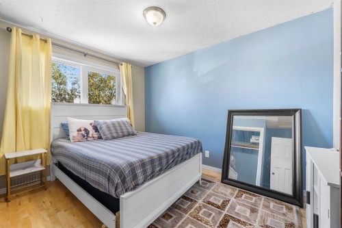 62 Fonda Crescent Se, Calgary, AB - Indoor Photo Showing Bedroom