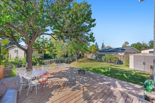 62 Fonda Crescent Se, Calgary, AB - Outdoor With Deck Patio Veranda