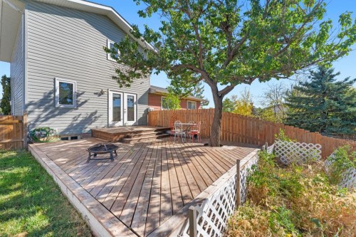 62 Fonda Crescent Se, Calgary, AB - Outdoor With Deck Patio Veranda