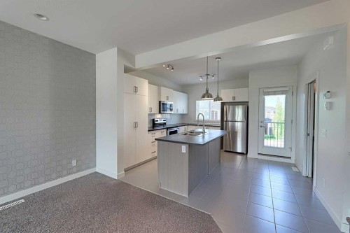 10 Walden Lane Se, Calgary, AB - Indoor Photo Showing Kitchen