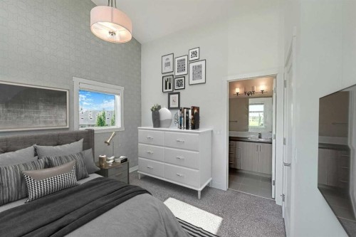 10 Walden Lane Se, Calgary, AB - Indoor Photo Showing Bedroom