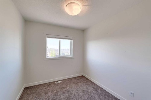 10 Walden Lane Se, Calgary, AB - Indoor Photo Showing Other Room