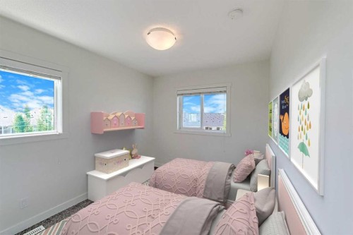 10 Walden Lane Se, Calgary, AB - Indoor Photo Showing Bedroom