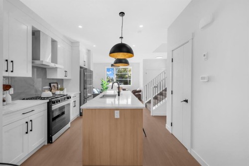 1848 24 Avenue Nw, Calgary, AB - Indoor Photo Showing Kitchen With Double Sink With Upgraded Kitchen