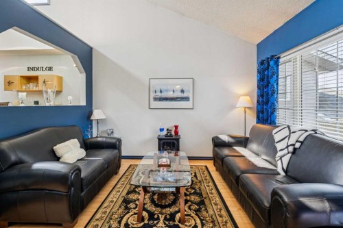 142 Elizabeth Way Se, Airdrie, AB - Indoor Photo Showing Living Room