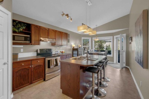 266 Canals Circle Sw, Airdrie, AB - Indoor Photo Showing Kitchen With Double Sink