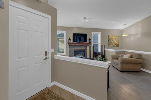 266 Canals Circle Sw, Airdrie, AB - Indoor With Fireplace