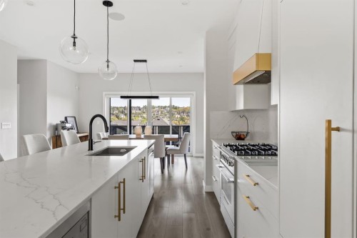 3048 85 Street Sw, Calgary, AB - Indoor Photo Showing Kitchen With Upgraded Kitchen