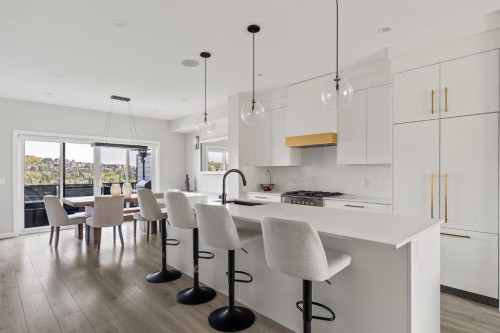 3048 85 Street Sw, Calgary, AB - Indoor Photo Showing Kitchen With Upgraded Kitchen