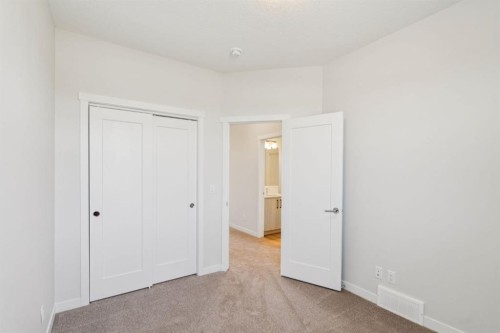 110-400 Belmont Street Sw, Calgary, AB - Indoor Photo Showing Other Room