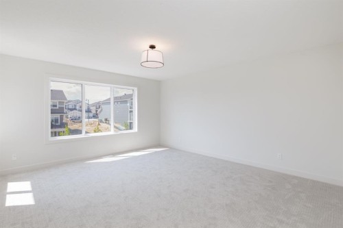 47 Sundown Crescent, Cochrane, AB - Indoor Photo Showing Other Room