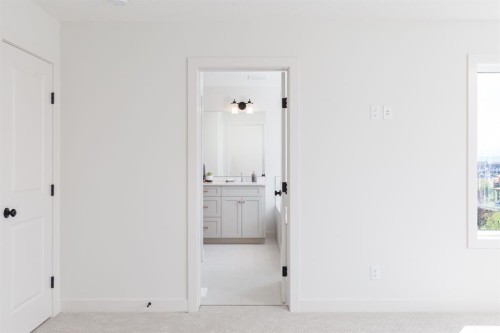 47 Sundown Crescent, Cochrane, AB - Indoor Photo Showing Other Room