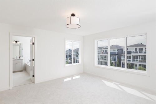 47 Sundown Crescent, Cochrane, AB - Indoor Photo Showing Other Room