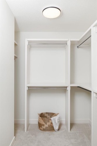 47 Sundown Crescent, Cochrane, AB - Indoor Photo Showing Other Room