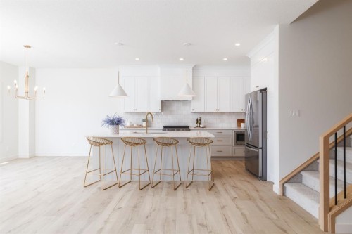 47 Sundown Crescent, Cochrane, AB - Indoor Photo Showing Kitchen