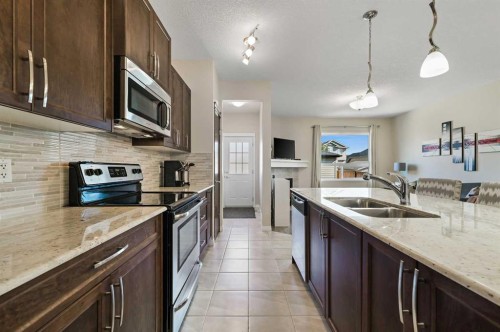 70 Nolanfield Terrace Nw, Calgary, AB - Indoor Photo Showing Kitchen With Stainless Steel Kitchen With Double Sink With Upgraded Kitchen