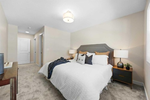 2150 Bayview Drive Sw, Airdrie, AB - Indoor Photo Showing Bedroom