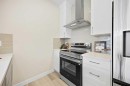 2150 Bayview Drive Sw, Airdrie, AB  - Indoor Photo Showing Kitchen 