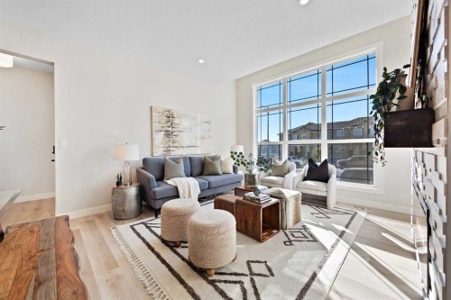 2150 Bayview Drive Sw, Airdrie, AB - Indoor Photo Showing Living Room