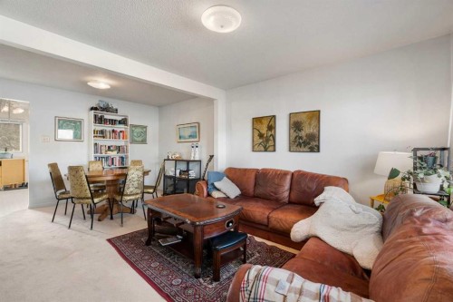 4327 20 Avenue Nw, Calgary, AB - Indoor Photo Showing Living Room