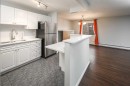 310-545 18 Avenue Sw, Calgary, AB  - Indoor Photo Showing Kitchen With Double Sink 