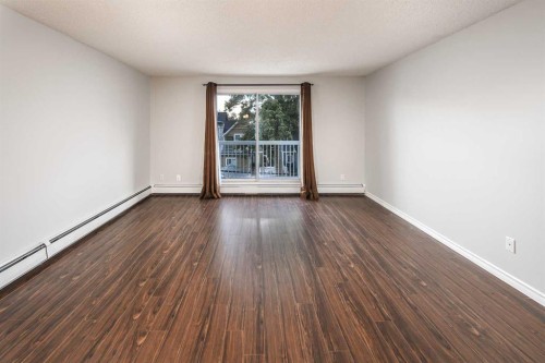 310-545 18 Avenue Sw, Calgary, AB - Indoor Photo Showing Other Room