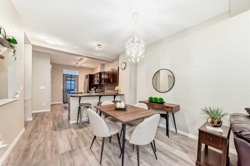 49 New Brighton Point Se, Calgary, AB - Indoor Photo Showing Dining Room