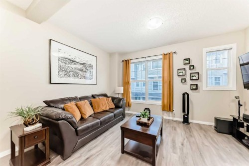 49 New Brighton Point Se, Calgary, AB - Indoor Photo Showing Living Room