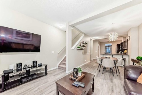 49 New Brighton Point Se, Calgary, AB - Indoor Photo Showing Living Room