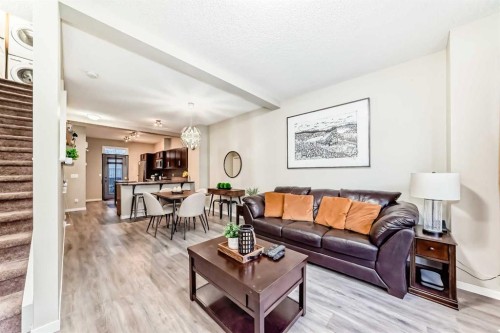 49 New Brighton Point Se, Calgary, AB - Indoor Photo Showing Living Room