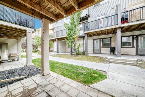 49 New Brighton Point Se, Calgary, AB - Outdoor With Balcony With Deck Patio Veranda