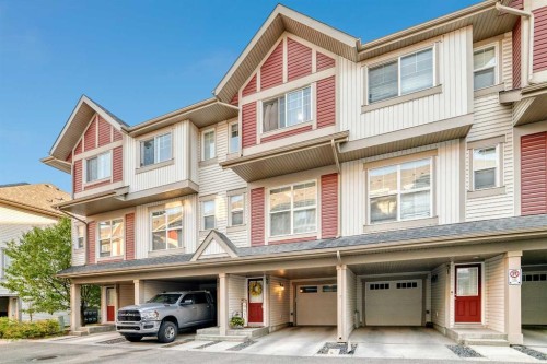 49 New Brighton Point Se, Calgary, AB - Outdoor With Facade