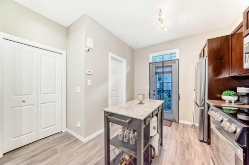 49 New Brighton Point Se, Calgary, AB - Indoor Photo Showing Kitchen