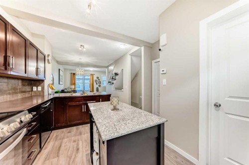 49 New Brighton Point Se, Calgary, AB - Indoor Photo Showing Kitchen