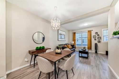 49 New Brighton Point Se, Calgary, AB - Indoor Photo Showing Dining Room