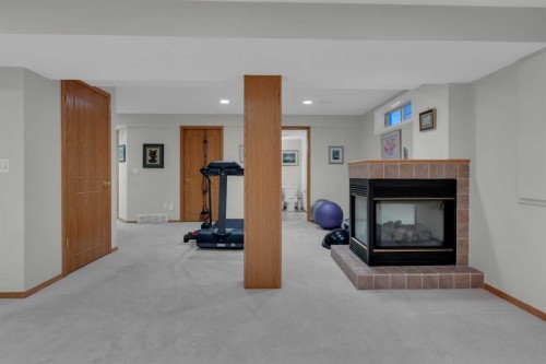 271 Mountain Park Drive Se, Calgary, AB - Indoor With Fireplace