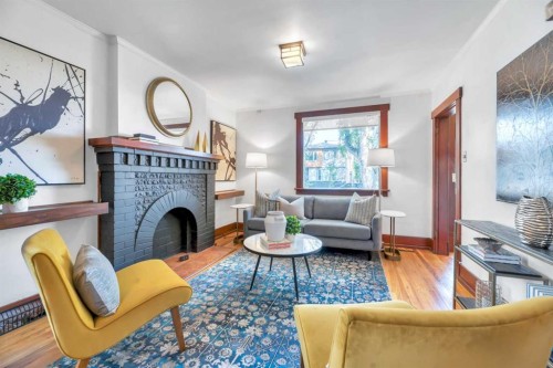111 11 Avenue Nw, Calgary, AB - Indoor Photo Showing Living Room With Fireplace