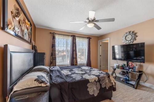 19 Saddlelake View Ne, Calgary, AB - Indoor Photo Showing Bedroom
