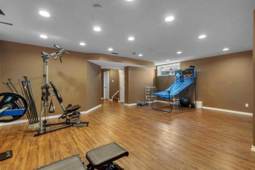 119 Valley Stream Circle Nw, Calgary, AB - Indoor Photo Showing Gym Room