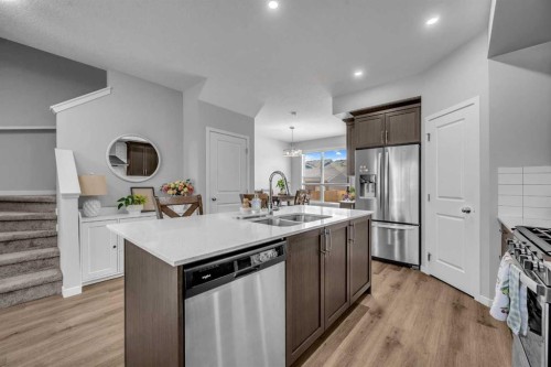 169 Dawson Drive, Chestermere, AB - Indoor Photo Showing Kitchen With Stainless Steel Kitchen With Double Sink With Upgraded Kitchen