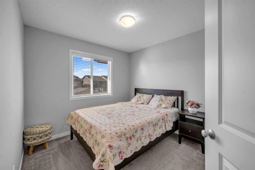 169 Dawson Drive, Chestermere, AB - Indoor Photo Showing Bedroom