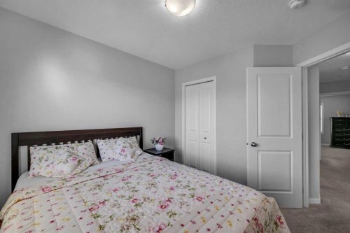 169 Dawson Drive, Chestermere, AB - Indoor Photo Showing Bedroom