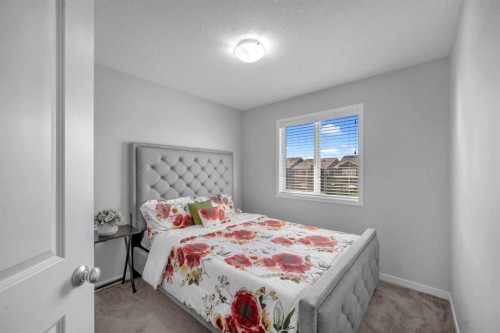 169 Dawson Drive, Chestermere, AB - Indoor Photo Showing Bedroom