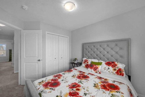 169 Dawson Drive, Chestermere, AB - Indoor Photo Showing Bedroom