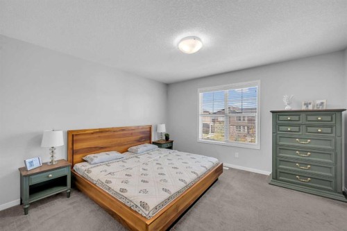 169 Dawson Drive, Chestermere, AB - Indoor Photo Showing Bedroom