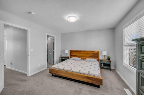169 Dawson Drive, Chestermere, AB - Indoor Photo Showing Bedroom