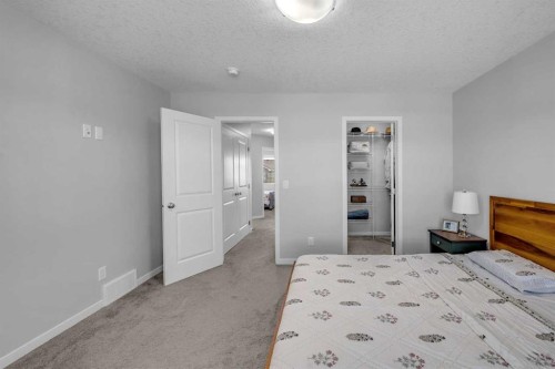 169 Dawson Drive, Chestermere, AB - Indoor Photo Showing Bedroom